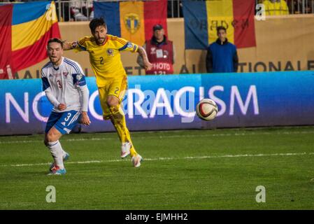 March 29, 2015: Viljormur Davidsen #3 of Faroe Islands National Team and Paul Papp #2 of Romania National Team in action during the 15th UEFA European Championship Qualifying Round game between Romania National Football Team (ROU) and Faroe Islands National Football Team (FRO) at ''Ilie Oana'' Stadium, Ploiesti in Ploiesti, Romania ROU. Catalin Soare/www.sportaction.ro Stock Photo