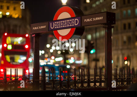 Underground sign, buses and lights. Trafalgar Square, London Stock Photo
