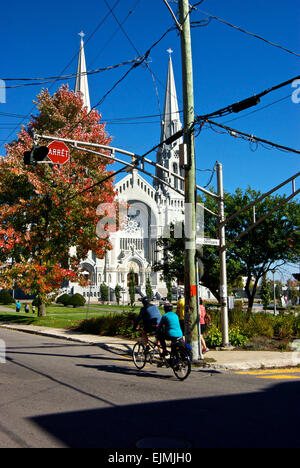 Cyclists tandem bicycle Sainte Anne de Beaupre Basilica Stock Photo