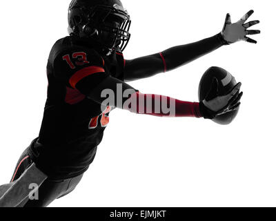 one american football player catching ball in silhouette shadow on white background Stock Photo