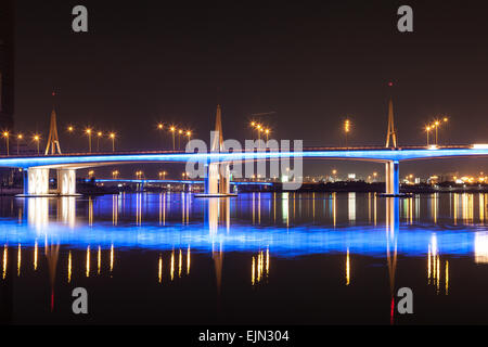 Al Garhoud Bridge illuminated at night. Dubai, United Arab Emirates Stock Photo