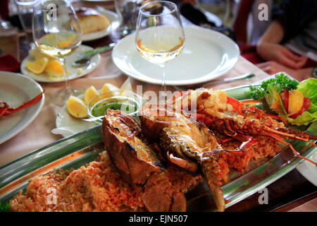 Lobsters on a plate with rice in restaurant Stock Photo