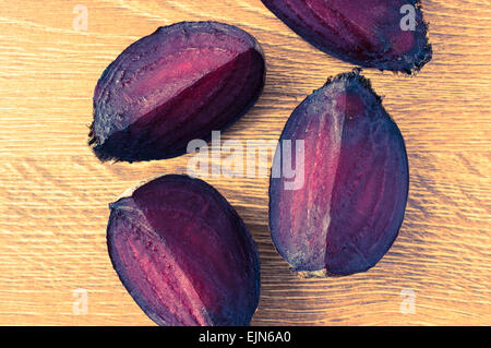 Beet slices on a wooden table top view Stock Photo