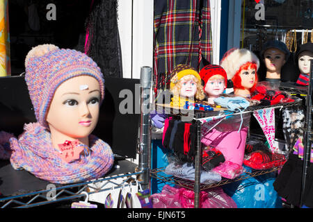 Woolly hats for sale at a stall on Llandudno pier, Conwy, Wales, UK Stock Photo