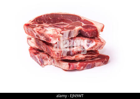 Uncooked New Zealand lamb chops isolated on a white studio background. Stock Photo