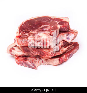 Uncooked New Zealand lamb chops isolated on a white studio background. Stock Photo