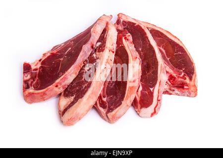 Uncooked New Zealand lamb chops isolated on a white studio background. Stock Photo