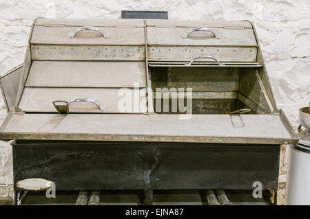 An old, dirty deep fat fryer as used in fish and chip shops Stock Photo