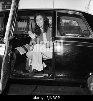 American rock singer Alice Cooper arrives in London ahead of his tour. 15th March 1974. Stock Photo