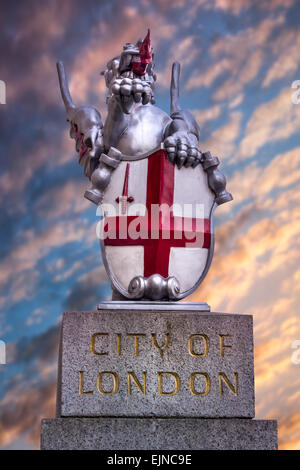 One of the City of London Dragon Crests on London Bridge in the city of London - England. Stock Photo