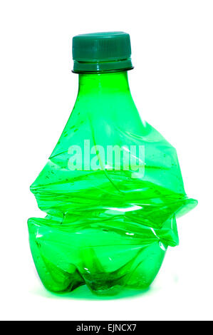 smashed green plastic bottle, on a white background Stock Photo