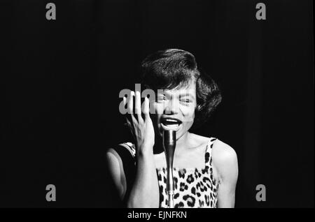 Eartha Kitt performing at 'Talk of the Town' 7th September 1960 Stock Photo