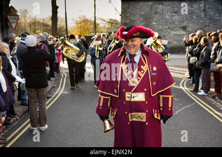 UK, England, Yorkshire, Grassington, Dickensian Festival, Town Crier Victor Watson leading Hebden Bridge Band in parade Stock Photo