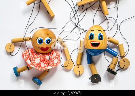 Fun string puppets on white background Stock Photo