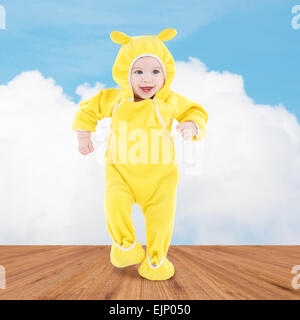 little happy baby making his first steps Stock Photo