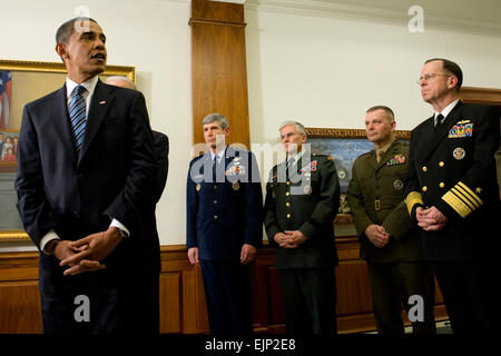 President of the United States Barack Obama, flanked by Gen. Norton Schwartz, U.S. Air Force chief of staff; Gen. George W. Casey, U.S. Army chief of staff; U.S. Marine Gen. James E. Cartwright, vice chairman of the Joint Chiefs of Staff and U.S. Navy Adm. Mike Mullen, chairman of the joint chiefs of staff, addresses the media during his first visit to the Pentagon since becoming commander-in-chief, Jan. 28, 2009. Obama and Vice President Joe Biden met with Secretary of Defense Robert M. Gates and all the service chiefs getting their inputs on the way ahead in Afghanistan and Iraq.  Mass Commu Stock Photo
