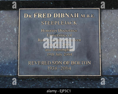 Memorial plaque in the centre of Bolton, which stands in front of the statue Fred Dibnah a famous steeplejack and son of Bolton. Stock Photo