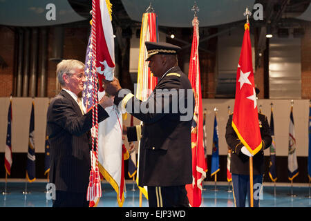 Secretary of the Army John McHugh presents the Vice Chief of Staff flag to U.S. Army Gen. Lloyd J. Austin III, the 33rd Vice Chief of Staff of the Army, during a ceremony in Fort Myer, VA Jan. 31, 2012.   Staff Sgt. Teddy Wade Stock Photo