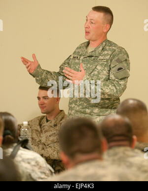 Retired Staff Sgt. Luke Wilson jokes that audience members can play with his prosthetic leg if they want to during a &quot;town hall meeting&quot; with Soldiers of 1st Brigade, 82nd Airborne Division, during a visit by wounded warriors participating in Operation Proper Exit, Oct. 15, at Camp Ramadi, Iraq.           'Proper Exit' helps wounded warriors complete their mission  /-news/2009/10/19/28966-proper-exit-helps-wounded-warriors-complete-their-mission/ Stock Photo