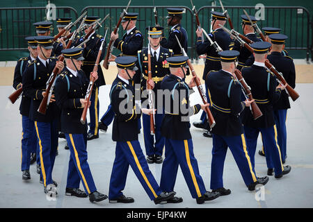The U.S. Army Drill Team displays a rifle performance in the 4th Annual Joint Service Drill Exhibition, during the National Cherry Blossom Festival at the Jefferson Memorial in Washington, D.C., April 9, 2011.  Teddy Wade Stock Photo