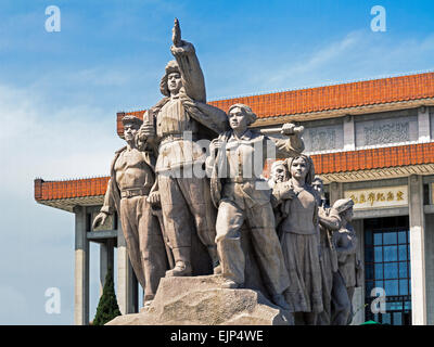 China, Beijing, statue of marching Chinese army soldiers in front of Chairman Mao Memorial Hall Mausoleum, Tiananmen Square Stock Photo