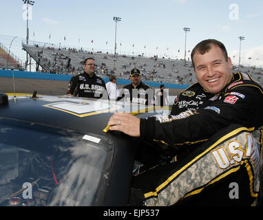 NASCAR driver Ryan Newman slips into the Army No. 39 Chevrolet Impala SS at Phoenix International Raceway Friday while qualifying for Sunday's race, in which he finished 20th.          Army to continue NHRA, NASCAR sponsorships  /-news/2009/11/17/30553-army-to-continue-nhra-nascar-sponsorships/ Stock Photo