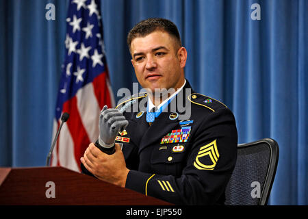 During a press conference following his induction into the Pentagon's Hall of Heroes, July 13, 2011,  Medal of Honor recipient Army Sgt. 1st. Class Leroy Petry describes in detail the combat action of May 26, 2008, near Paktya, Afghanistan, during which he distinguished himself by conspicuous gallantry in saving the lives of two fellow Rangers.  Petry's right hand was traumatically amputated during the fight and he now uses a state-of-the-art prosthesis, which  allows him amazing dexterity.   R. D. Ward  Released Stock Photo