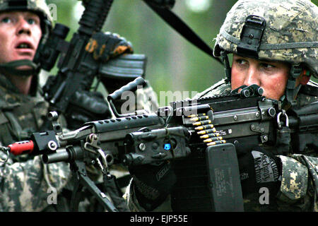 Soldiers assigned to Company C, 1st Battalion, 148th Infantry Regiment, 37th Infantry Brigade Combat Team, seek out opposing forces during Urban Operations training at Camp Shelby Joint Forces Training Center, Miss. on Sept. 28, 2011. The brigade is deploying about 3,400 Soldiers to Afghanistan in support of Operation Enduring Freedom. Ohio National Guard photo by Spc. Kimberly Lamb Released Stock Photo