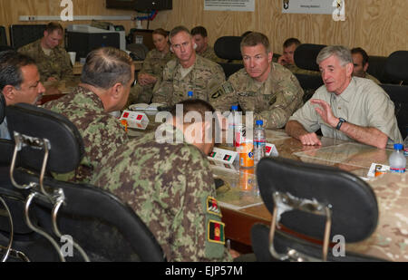 Secretary of the Army John McHugh, speaks with Afghan National Army Maj. Gen. Muhammad Waziri, the commander of the ANA 201st Corps, at Forward Operating Base Gamberi, June 20, 2013. While at FOB Gamberi. McHugh also spoke with senior leaders of the 4th Brigade Combat Team, 1st Cavalry Division on the progress of the ANA.  Spc. John G. Martinez Stock Photo