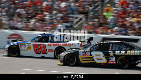 Dale Earnhardt Jr., driving the number 88 National Guard Chevy, and Mark Martin, in the number eight Army car, battle for position on the front stretch of Texas Motor Speedway Sunday April 2008.  Martin’s Army team fought hard all day and finished in eighth place, including picking up two spots on the final lap.  Earnhardt started the race on the pole and led the 43-car field for 31 laps, but fell back due to handling issues, crossing the finish line a lap down in twelfth-place.  Lt. Col. William Dean Thurmond, Stock Photo