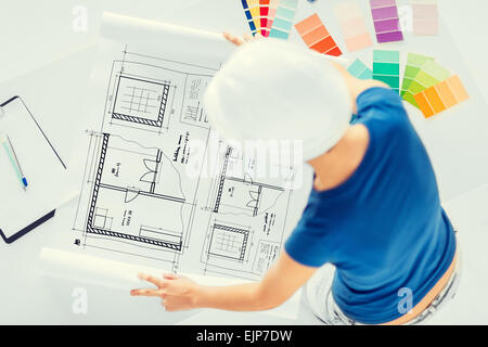 woman with color samples and blueprint Stock Photo