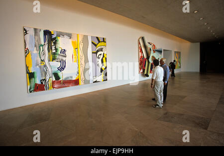 Paintings by Roy Lichtenstein (left) and Frank Stella are on display in the East Wing of the National Gallery of Art, Washington Stock Photo