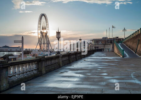 Sunset on Brighton seafront, East Sussex, England. Brighton Wheel in the distance. Stock Photo