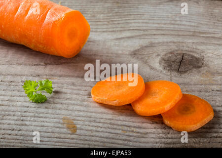 Chopped carrot on a wood board,shallow dof Stock Photo