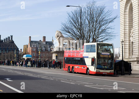 Open Top Red London Bus on the Westminster Bridge Advertising Sight Seeing Tours of London Stock Photo