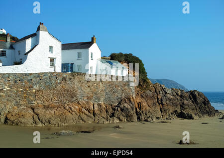 Homes overlooking the beach at Gorran Haven in Cornwall, UK Stock Photo