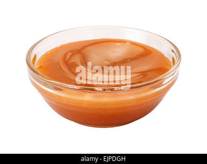 Creamy Caramel Syrup in a glass bowl. Stock Photo