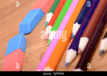 pencil set on wooden plate with eraser Stock Photo