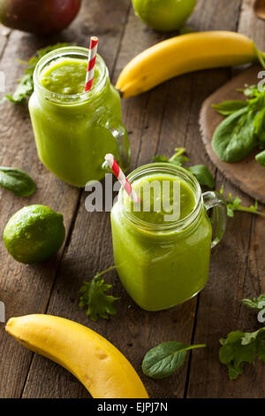 Healthy Organic Green Fruit Smoothie with Spinach and Apples Stock Photo