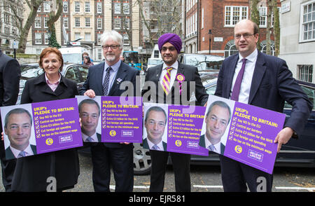 Mark Reckless,UKIP MP, poses UKIP candidates as Nigel Farage,the UKIP leader launches UKIP's election pledges in Smith Square Stock Photo