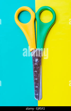 scissors on colored background Stock Photo