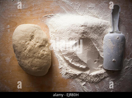 High angle view of flour and dough on table Stock Photo