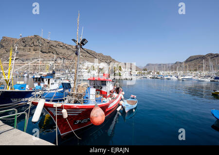 Fishing boats moored in Puerto de Mogan harbour, Gran Canaria, Spain Stock Photo