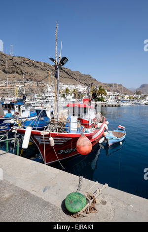 Fishing boats moored in Puerto de Mogan harbour, Gran Canaria, Spain Stock Photo