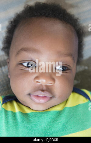 Close up of smiling face of Black baby boy Stock Photo