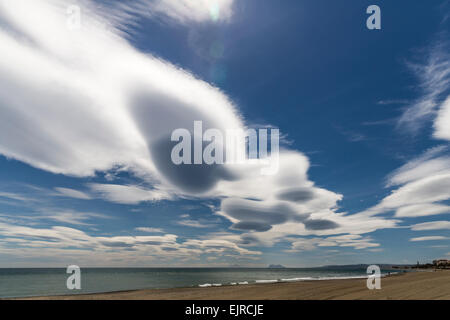 Lenticular cloud formations over the Mediterranean on The Costa del Sol, Andalusia, Spain Stock Photo