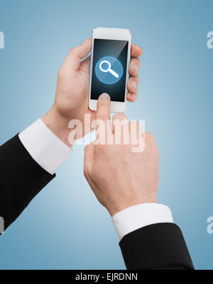 businessman touching screen of smartphone Stock Photo