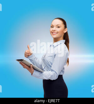 smiling woman looking at tablet pc computer Stock Photo