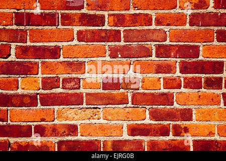 A brick wall in traditional orange and red brick colors Stock Photo