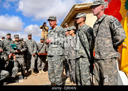 U.S. Army Gen. David H. Petraeus, commander of U.S. and international forces in Afghanistan, addresses troops during his visit to Forward Operating Base Lagman. Afghanistan, Jan. 17, 2011. The soldiers are assigned to the 2nd Stryker Cavalry Regiment.  Sgt. Gerald Wilson Stock Photo